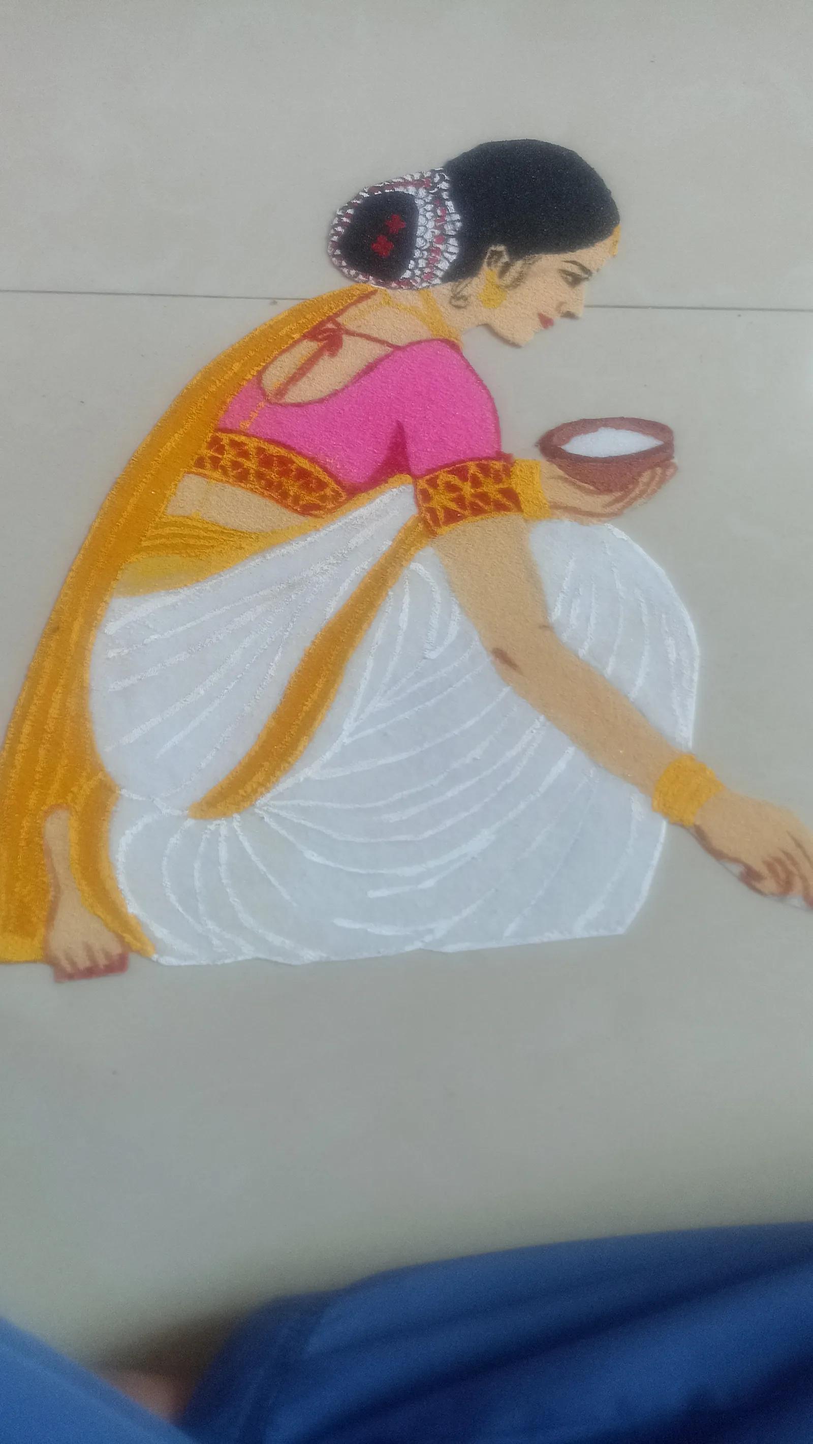 Kneeling Woman Drawing Rangoli – Large Patch Rangoli